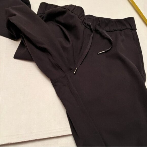 Lululemon  * On The Fly Pant Black Designed for: Office Travel Commute EUC 26” - Picture 12 of 16